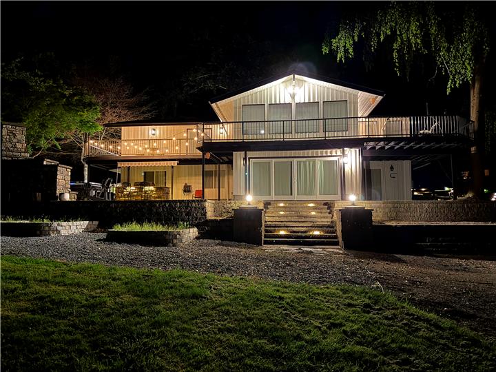 The house lit up at night