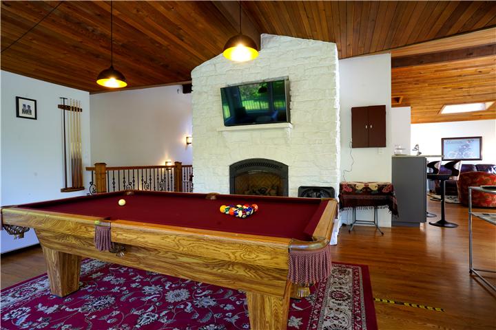 Game room fireplace and TV