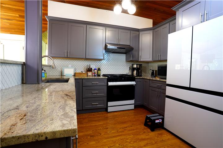 Kitchen with granite peninsula