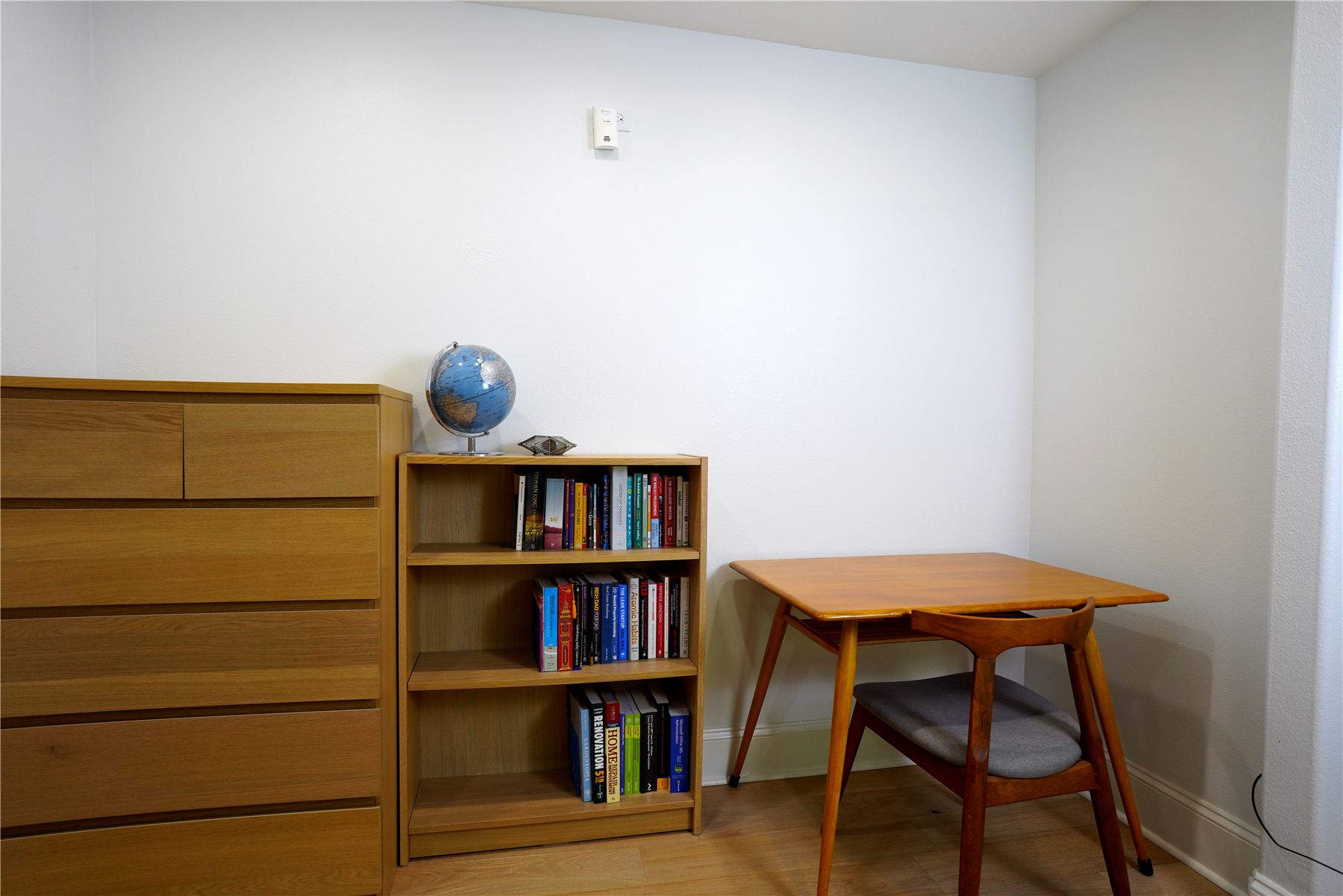 Work area with desk and bookshelf